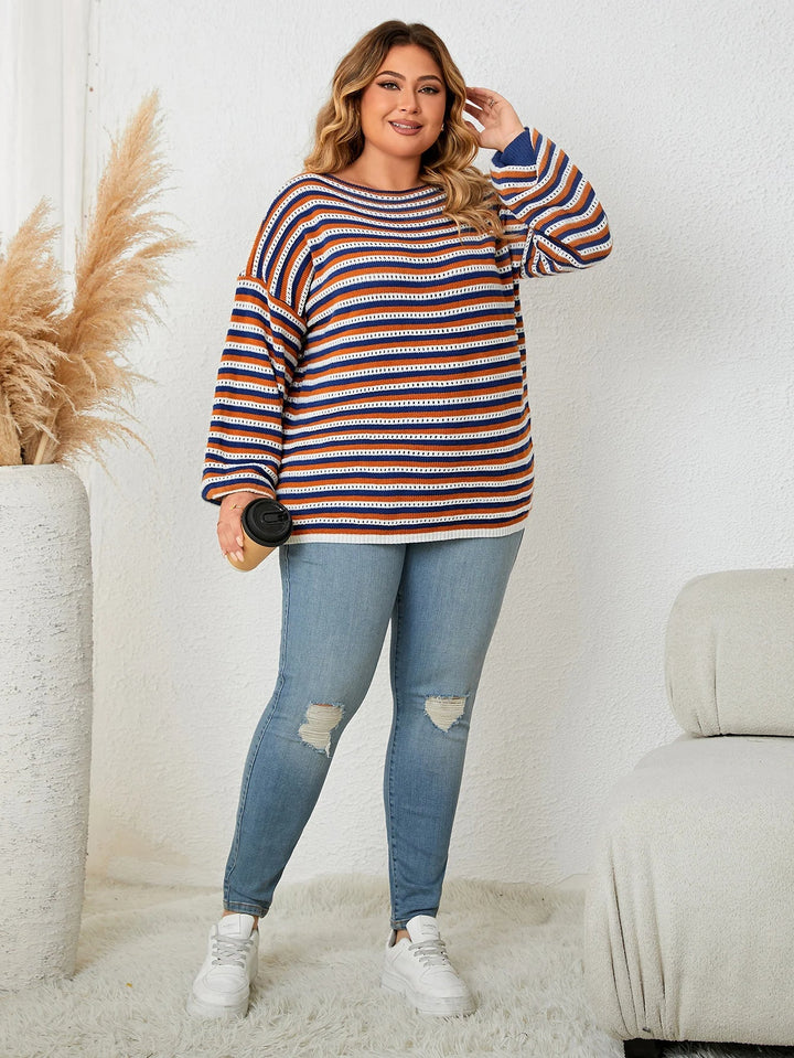 Stylish women's plus size striped oversized sweater. Cozy knit pullover with long sleeves, perfect for fall & winter.