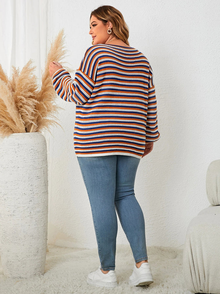 Chic plus size striped pullover sweater for women, featuring a cozy knit and long sleeves. Ideal for fall & winter outfits.