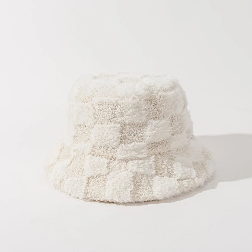 Soft plush women's bucket hat with black and white checkerboard pattern. A cozy fall/winter accessory.