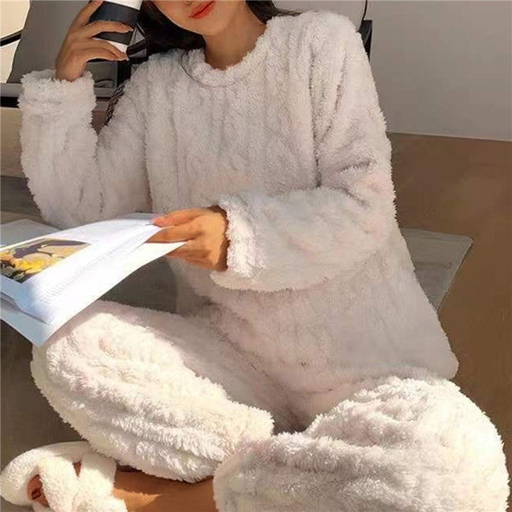 Model wearing women's plush pajama set, perfect for cozy and warm sleep.