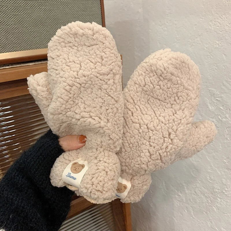 Women's plush teddy mittens in a soft, cozy fabric for ultimate winter warmth and comfort.