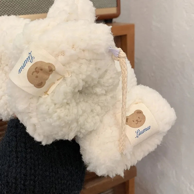 Luxurious women's teddy mittens, soft and warm, perfect for everyday winter elegance and comfort.