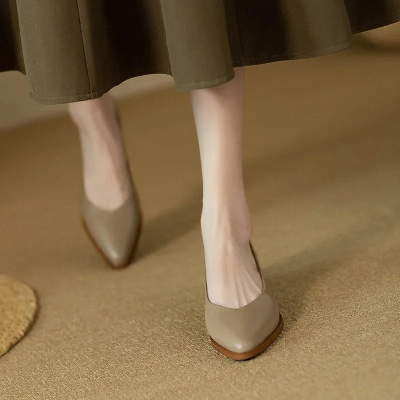 Timeless women's pointed toe block heel court shoes, perfect for professional and chic outfits.