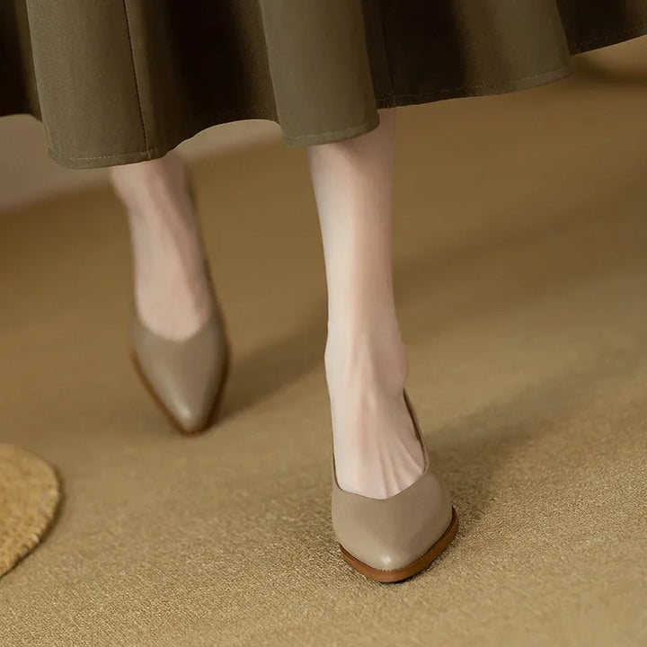 Timeless women's pointed toe block heel court shoes, perfect for professional and chic outfits.