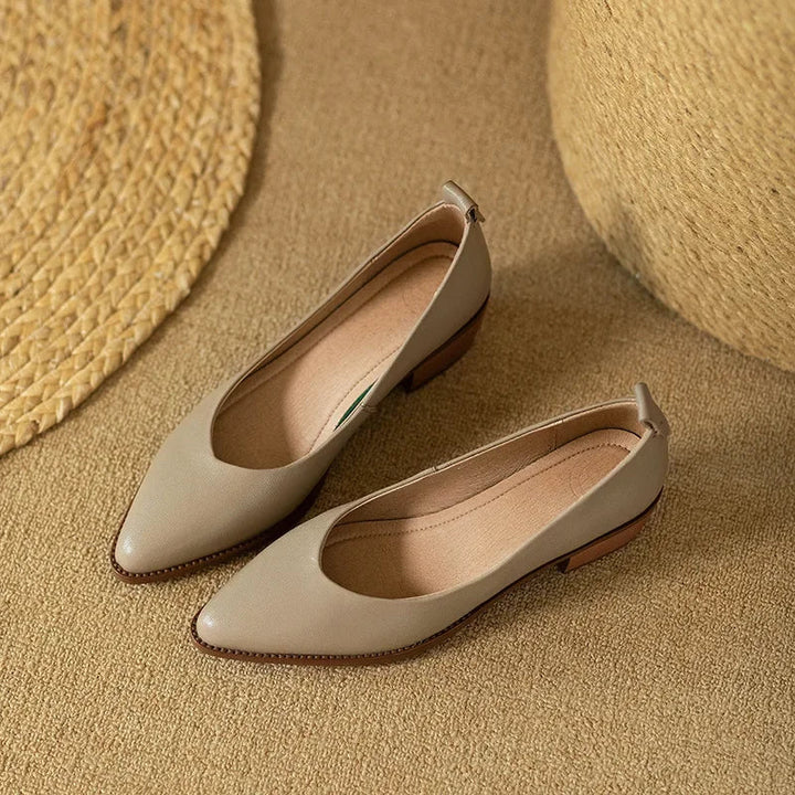 Professional women's footwear: pointed toe block heel slip-on court shoes for office elegance.