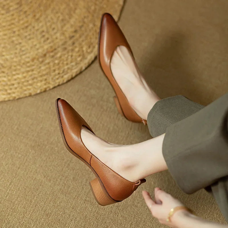 Comfortable & chic women's pointed toe block heel court shoes; versatile slip-on design.