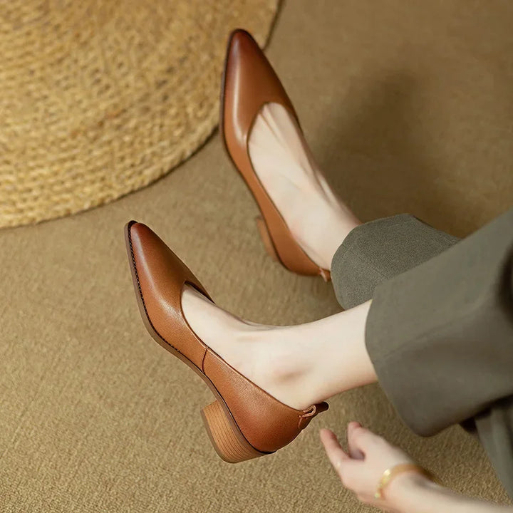 Comfortable & chic women's pointed toe block heel court shoes; versatile slip-on design.