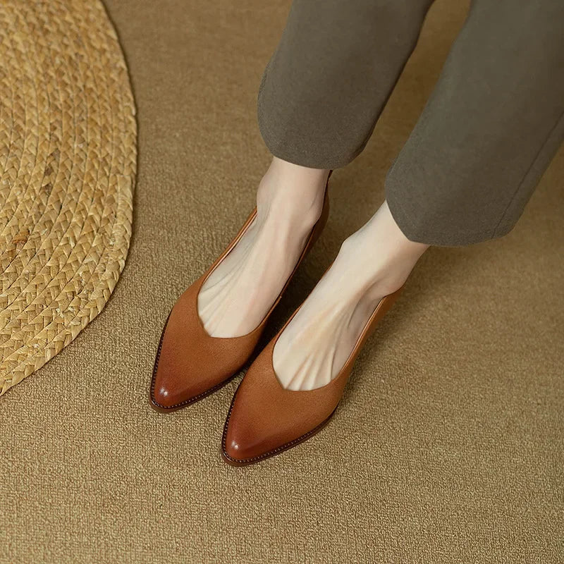 Timeless women's pointed toe block heel court shoes, slip-on style, perfect for office & professional wear.