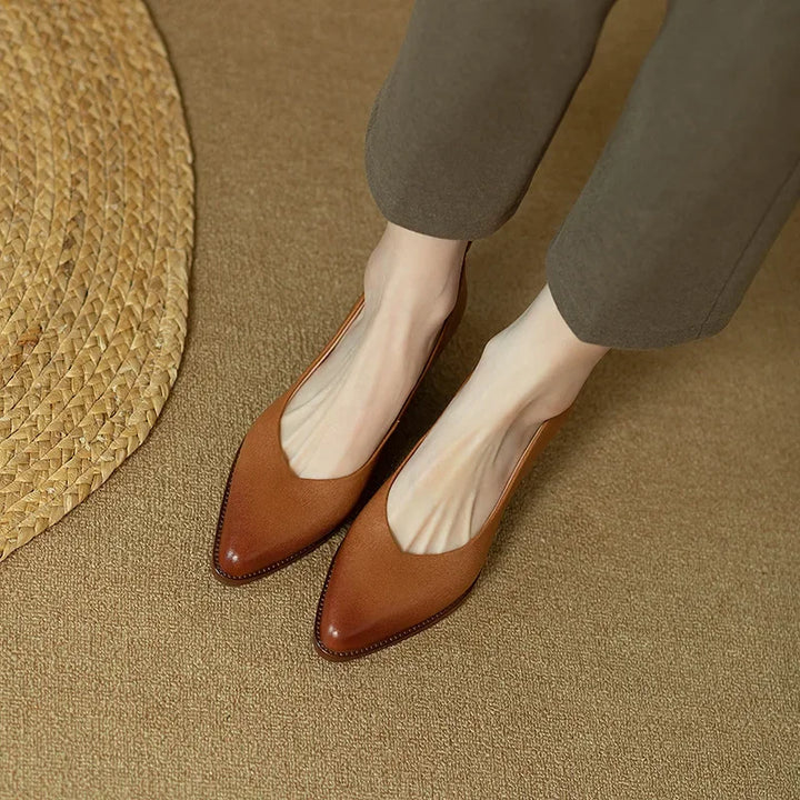 Timeless women's pointed toe block heel court shoes, slip-on style, perfect for office & professional wear.