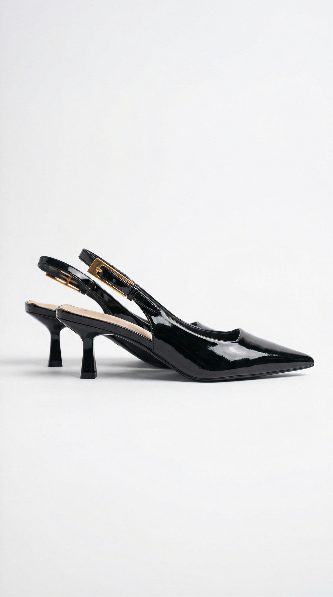 Stylish women's pointed toe kitten heel slingback pumps, perfect for elegant formal wear.