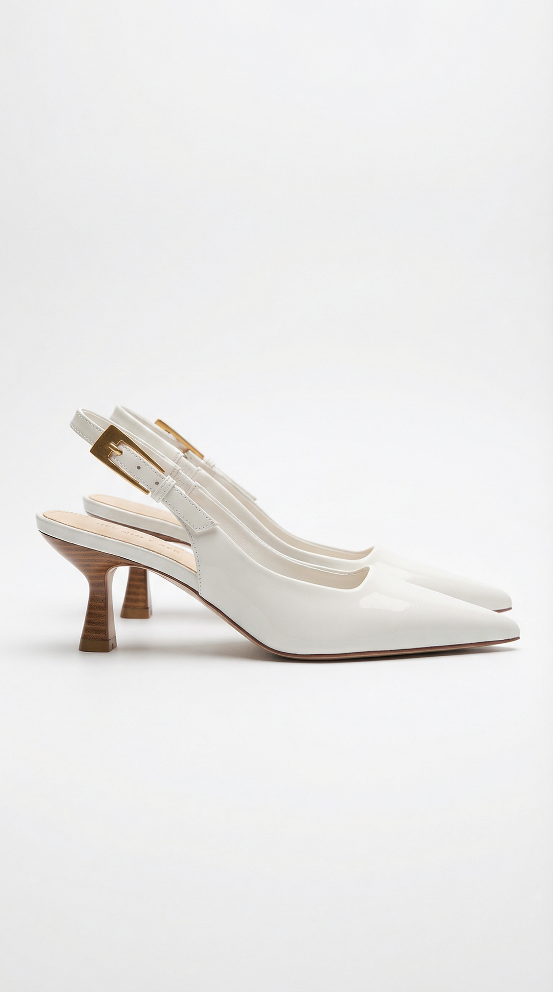 Formal women's slingback pumps, featuring a pointed toe and comfortable kitten heel for day to night.