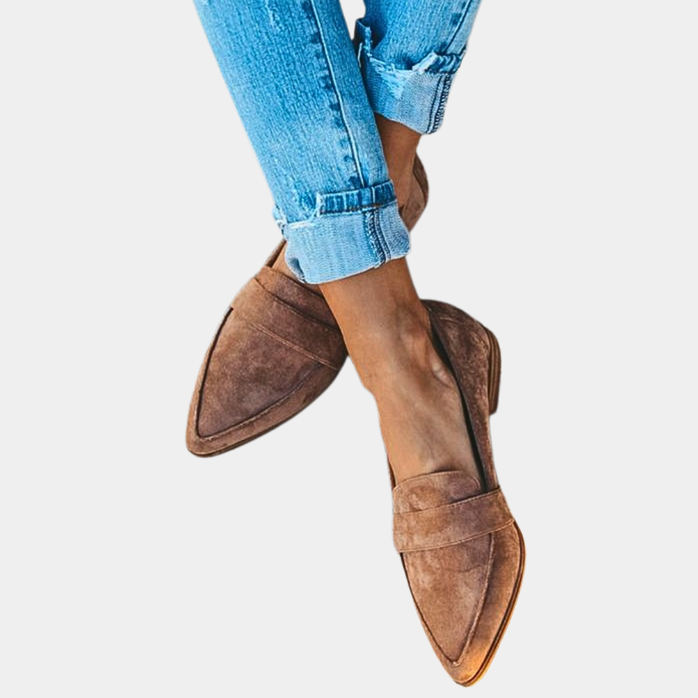 Elegant women's pointed-toe flats, slip-on design for versatile casual and professional outfits.