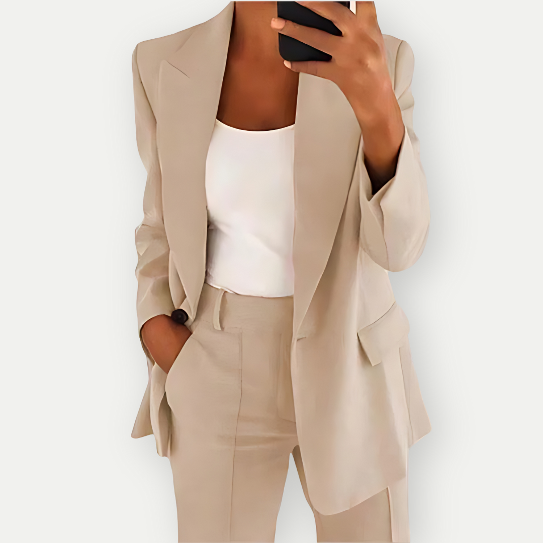 Women's polished versatile blazer set. Elegant two-piece suit for formal, office, or business casual wear.