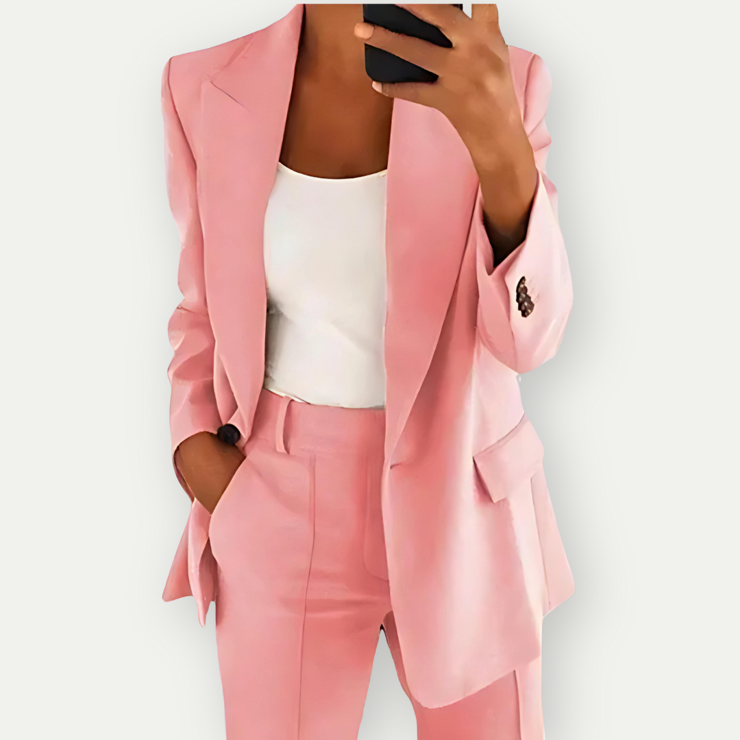 High-quality women's blazer set, showcasing polished fabric and versatile design. Perfect for professional and formal wear.