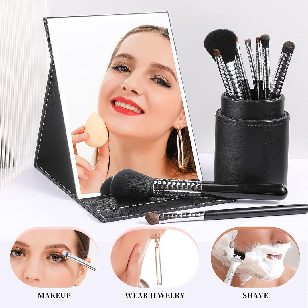 Durable women's compact make-up mirror with a sleek design and adjustable stand for beauty needs.