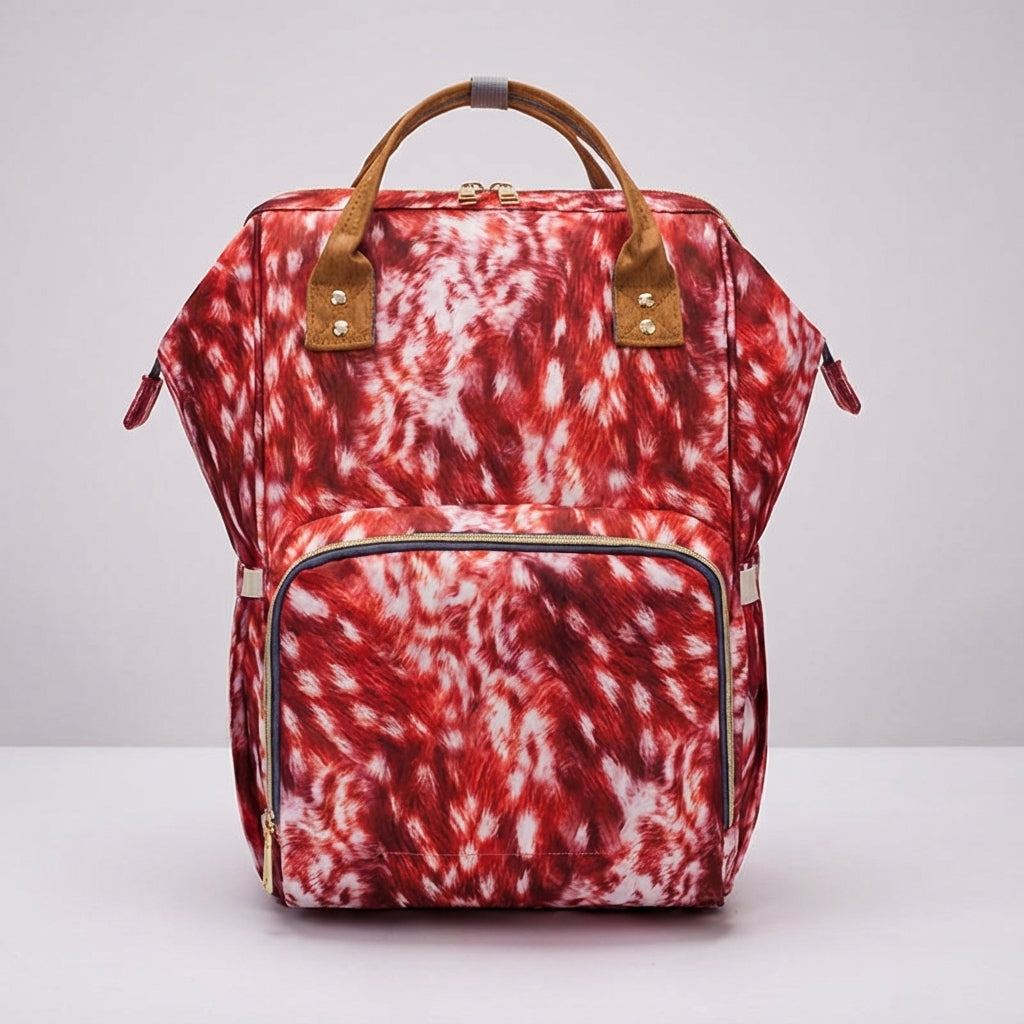 Smart interior compartments & insulated pockets of a women's diaper & travel backpack for organization.