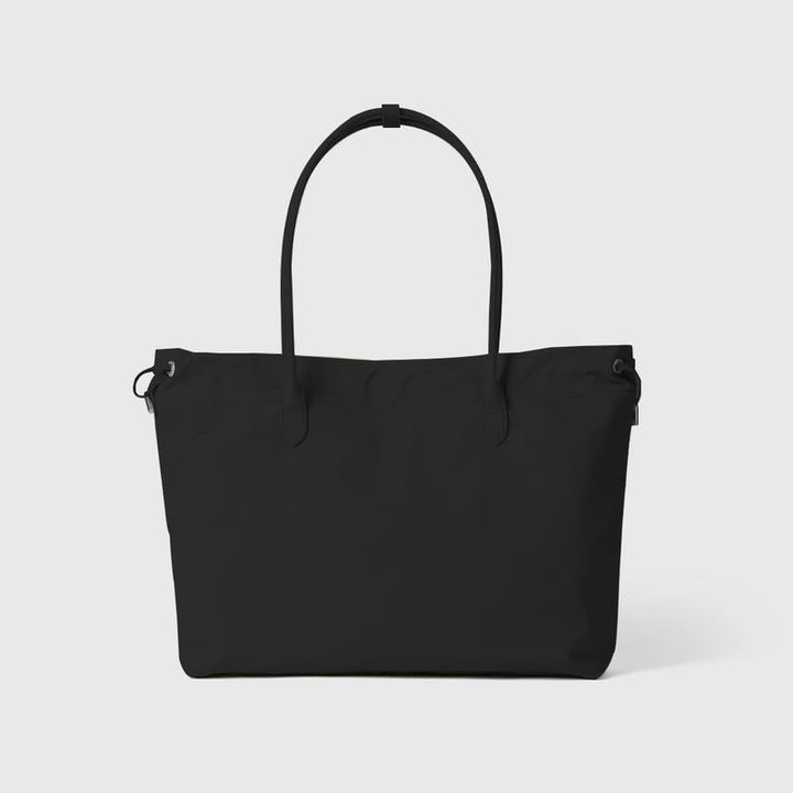 Black women's leather shoulder bag, premium quality & minimalist, ideal everyday or work tote.