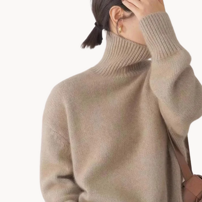 Elegant beige women's cozy turtleneck sweater. Premium soft knit, relaxed fit, a must-have fall essential.