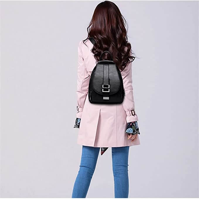 Modern women's leather backpack, water resistant finish, perfect for city life.