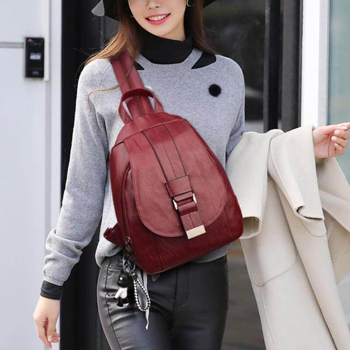Premium water resistant leather backpack for women, elegant and spacious design.