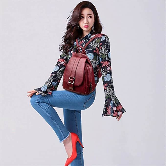 Stylish women's leather travel backpack, water resistant and sturdy construction.