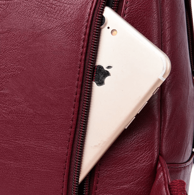 Women's versatile water resistant leather backpack, ideal for active lifestyles.