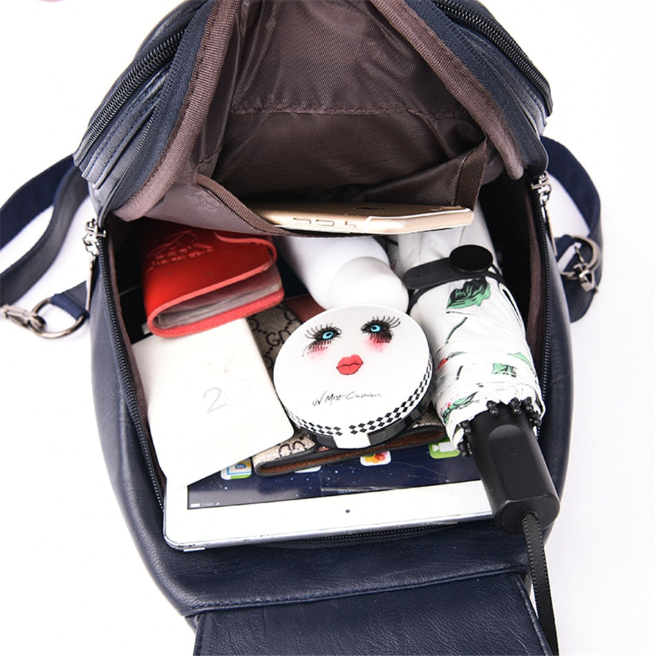 Versatile women's water resistant leather backpack, ideal for work or travel, tan shade.