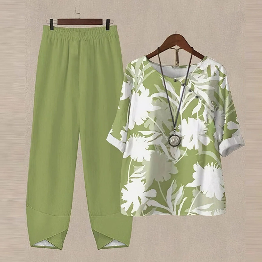 Fashionable women's printed blouse & pants set, a modern two-piece outfit offering casual chic elegance.