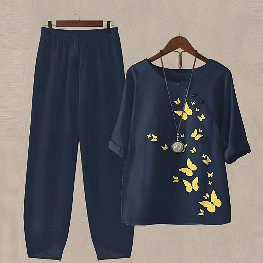 Women's comfortable printed blouse and pants set, a stylish two-piece outfit perfect for casual chic elegance.