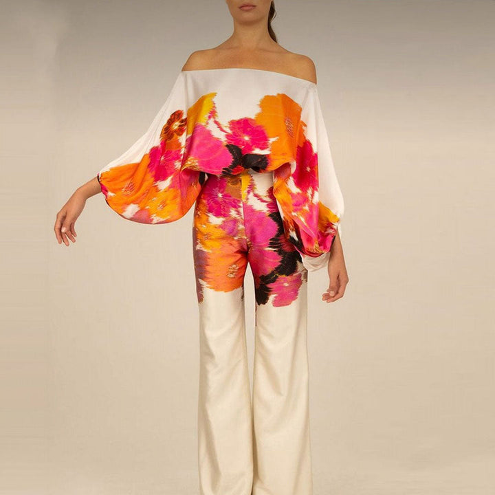 Fashionable women's wide-leg printed pants, part of a chic two-piece co-ord set. Ideal for summer style.
