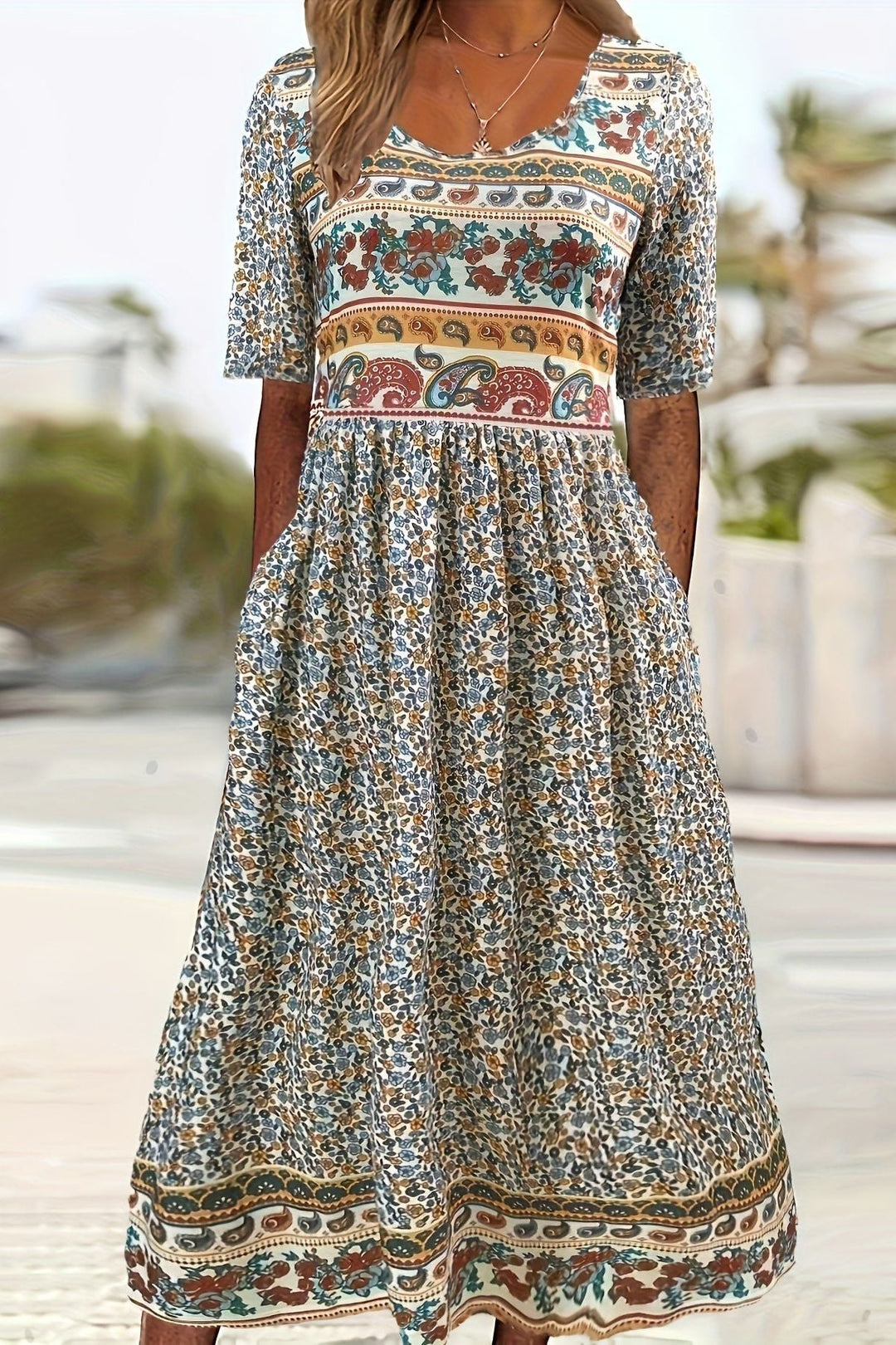 Women's printed relaxed midi dress, perfect for effortless casual elegance & all-day comfort. Flowy summer fashion.