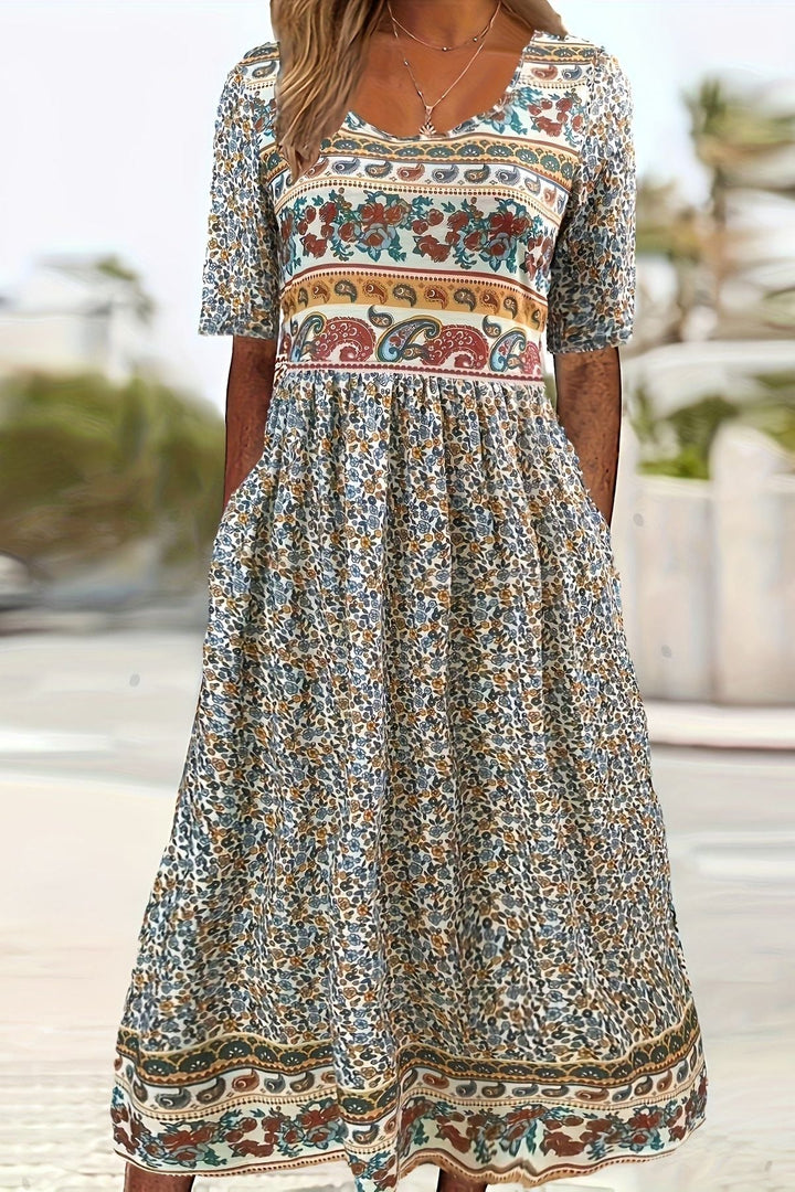 Women's printed relaxed midi dress, perfect for effortless casual elegance & all-day comfort. Flowy summer fashion.