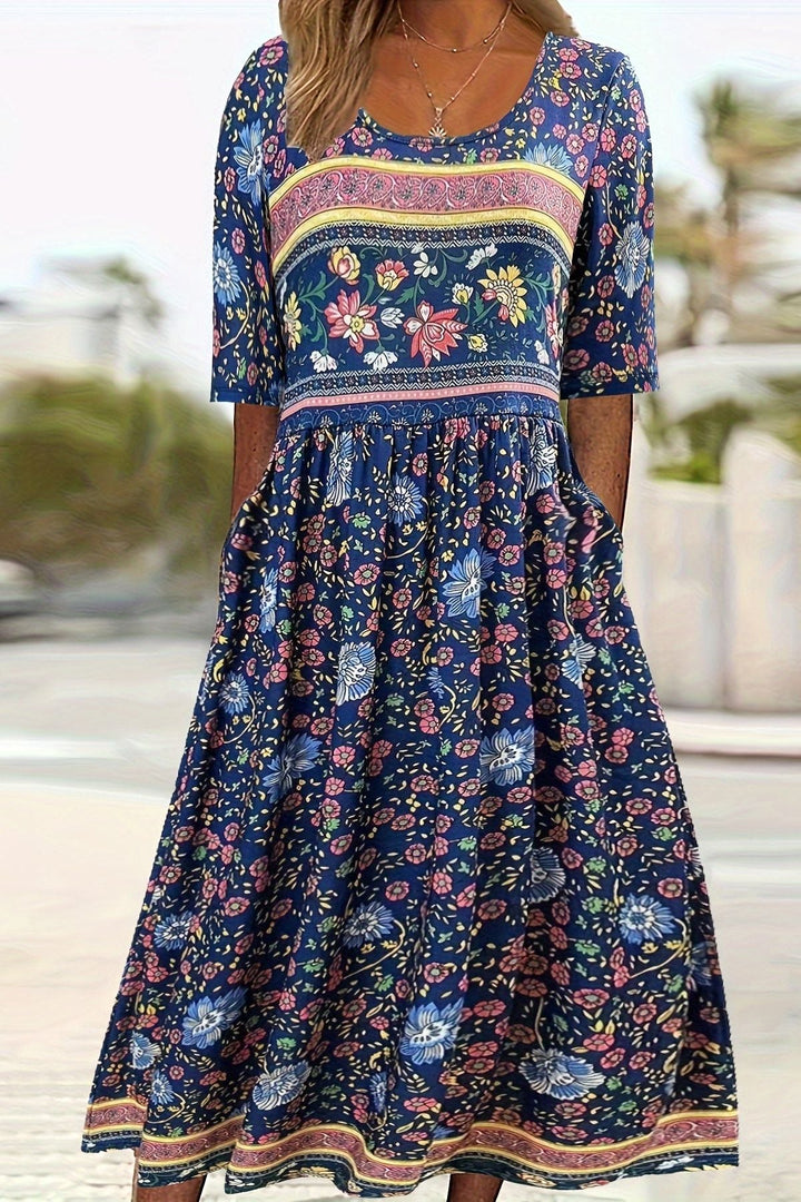 Comfortable women's printed midi dress, relaxed and versatile for summer fashion. Embrace casual elegance effortlessly.