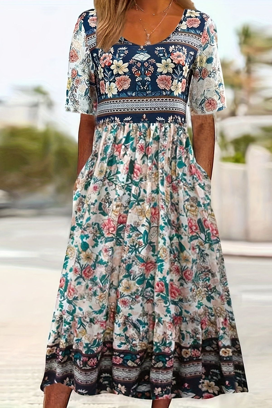 Stylish women's printed midi dress in a relaxed fit. Offers ultimate comfort for versatile summer outfits & easy wear.