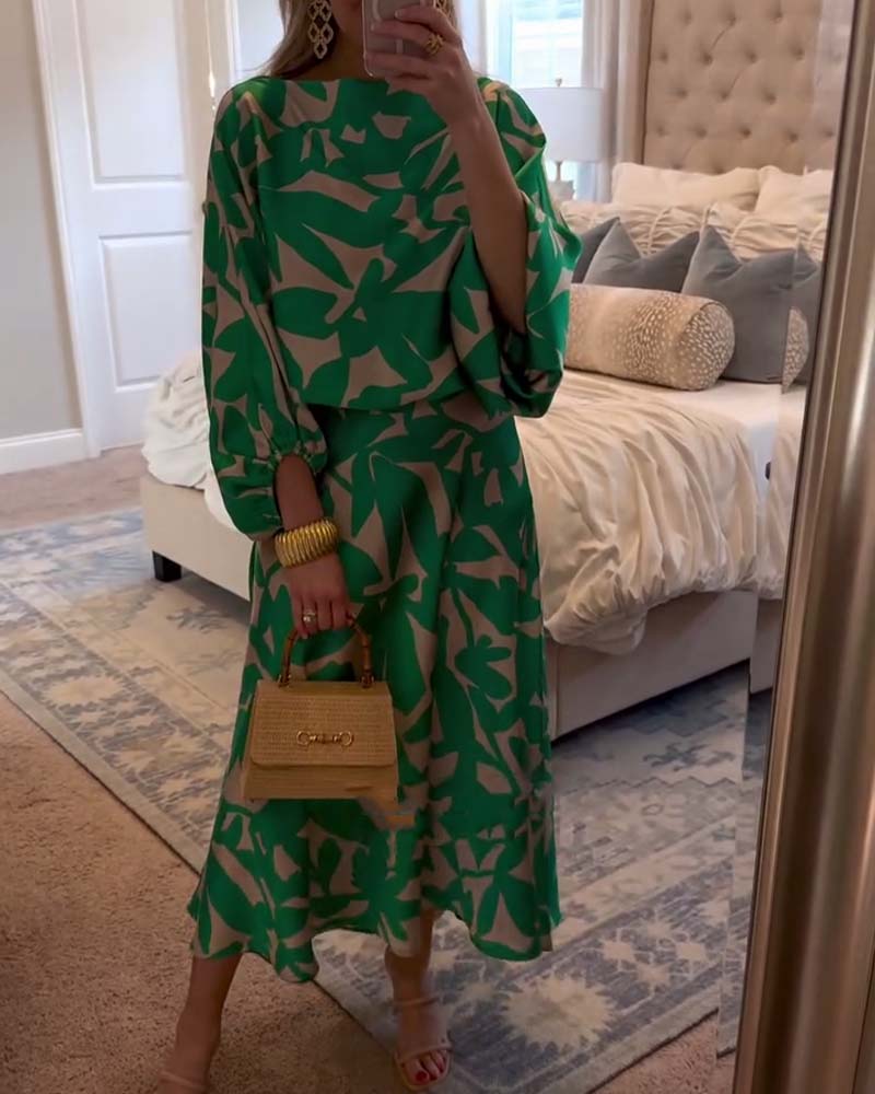 Women's printed two-piece set with elegant lantern sleeves, perfect for spring/summer fashion.
