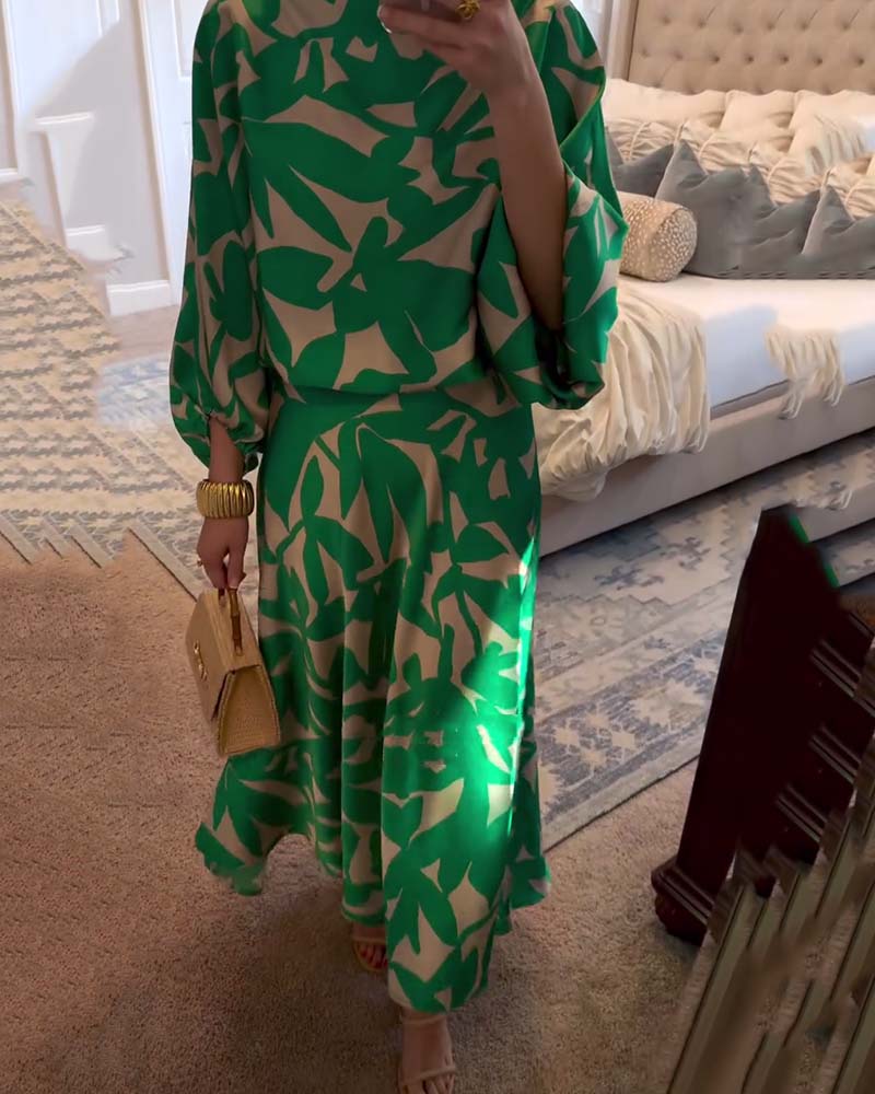 Women's two-piece set showcasing a vibrant print and trendy lantern sleeves.