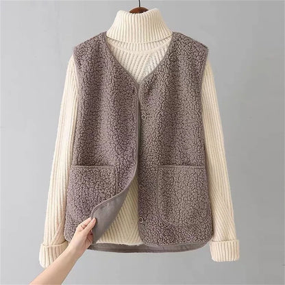Stylish women's Provence vest, ideal for chic layering over tops, offering comfort for autumn & winter.
