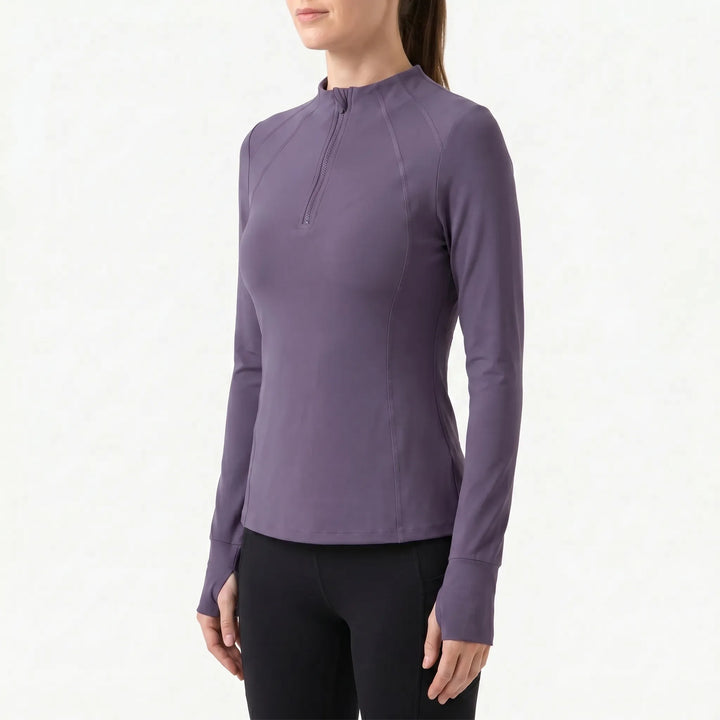 Versatile women's quarter-zip activewear top, long sleeve for gym, running, hiking, and comfortable fitness apparel.