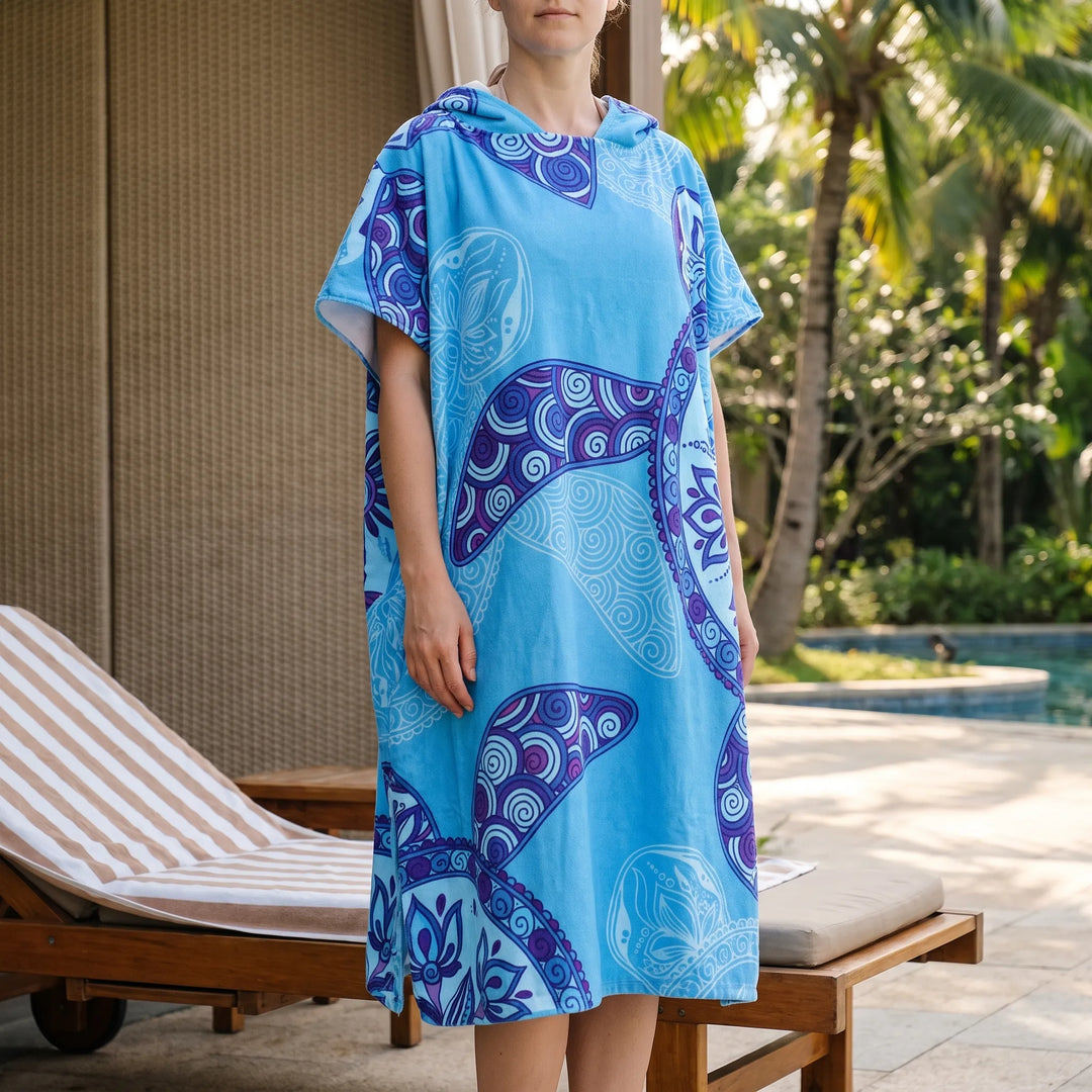 Women's quick-dry hooded changing poncho with tropical print, perfect for beach, pool or surf.