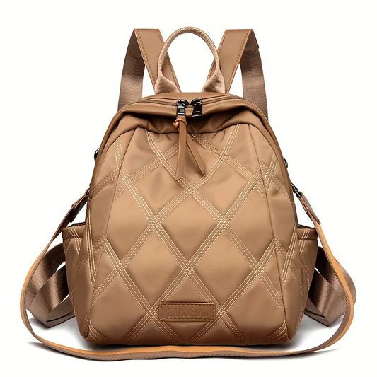 Women's quilted convertible backpack, a versatile nylon travel bag and shoulder tote.