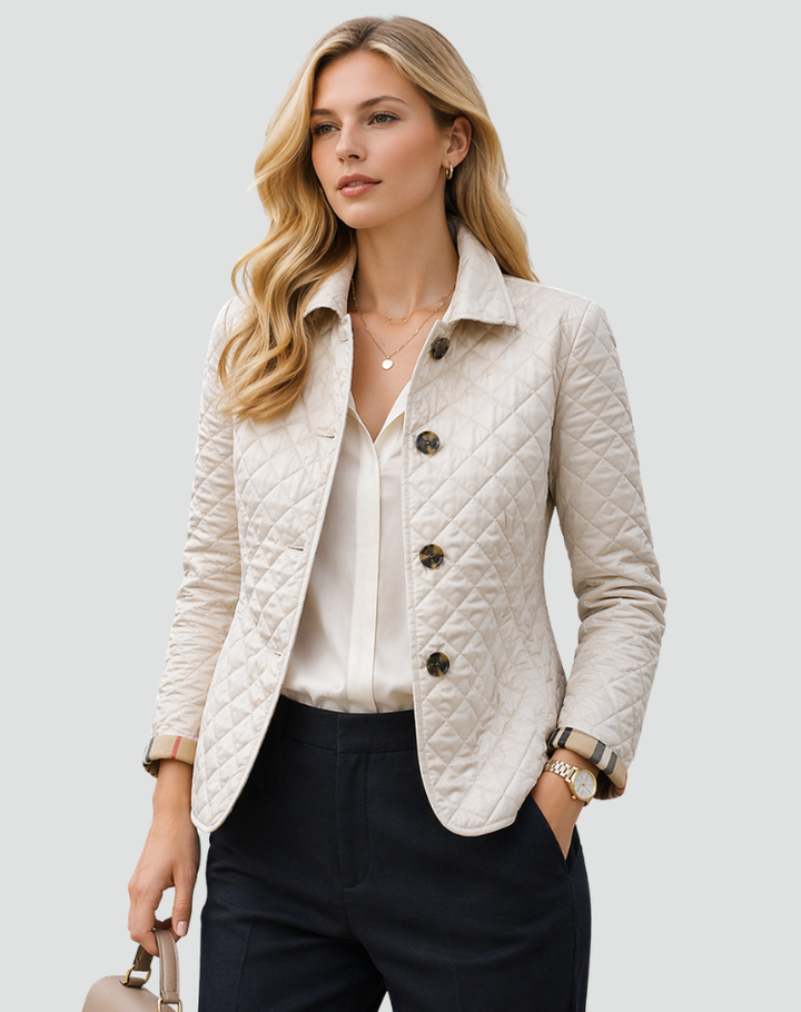 Stylish ladies' quilted jacket with structured collar, perfect for fall & spring.