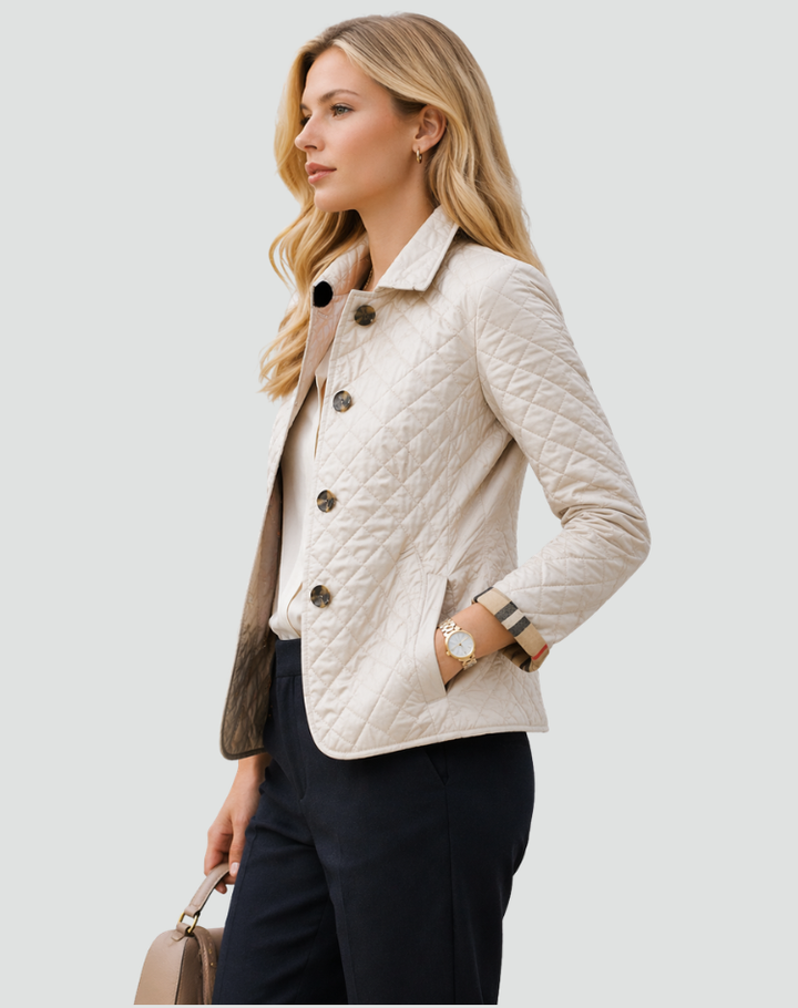 Elegant women's quilted jacket, a stylish design with structured collar & button front.