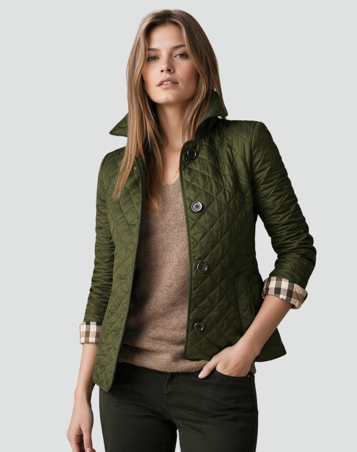 Modern women's quilted jacket, lightweight & comfortable, featuring a structured collar & button front.