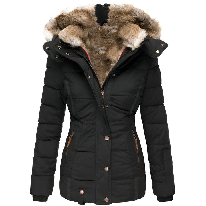 Women's quilted puffer jacket with plush hood trim, perfect for stylish winter warmth.