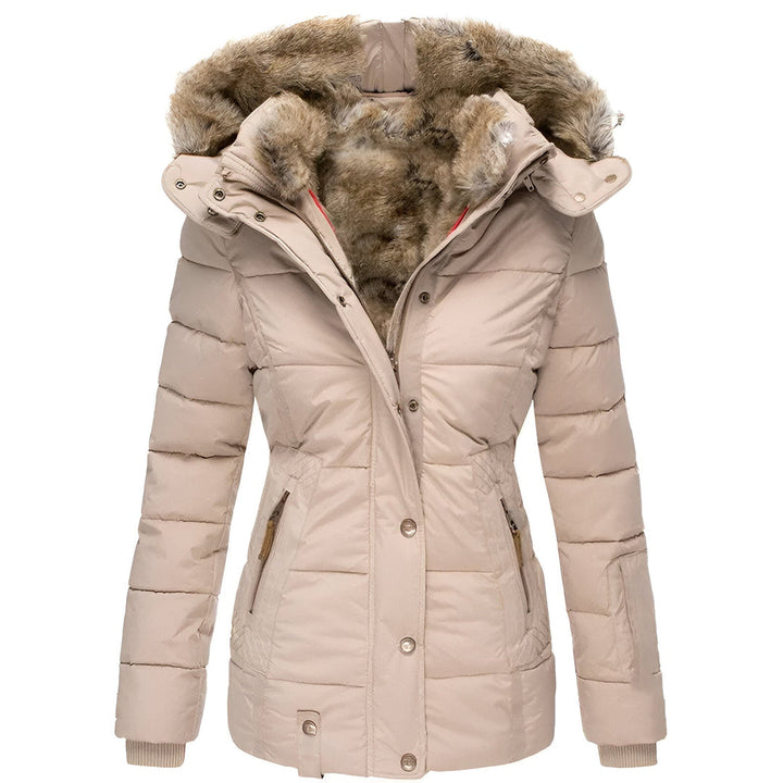 Warm women's puffer jacket featuring a fashionable quilted design & luxurious plush hood.