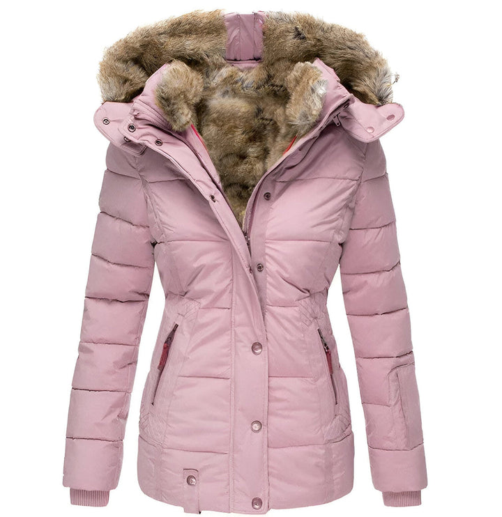 Fall/winter essential: women's hooded quilted puffer jacket, offering cozy cold weather protection.