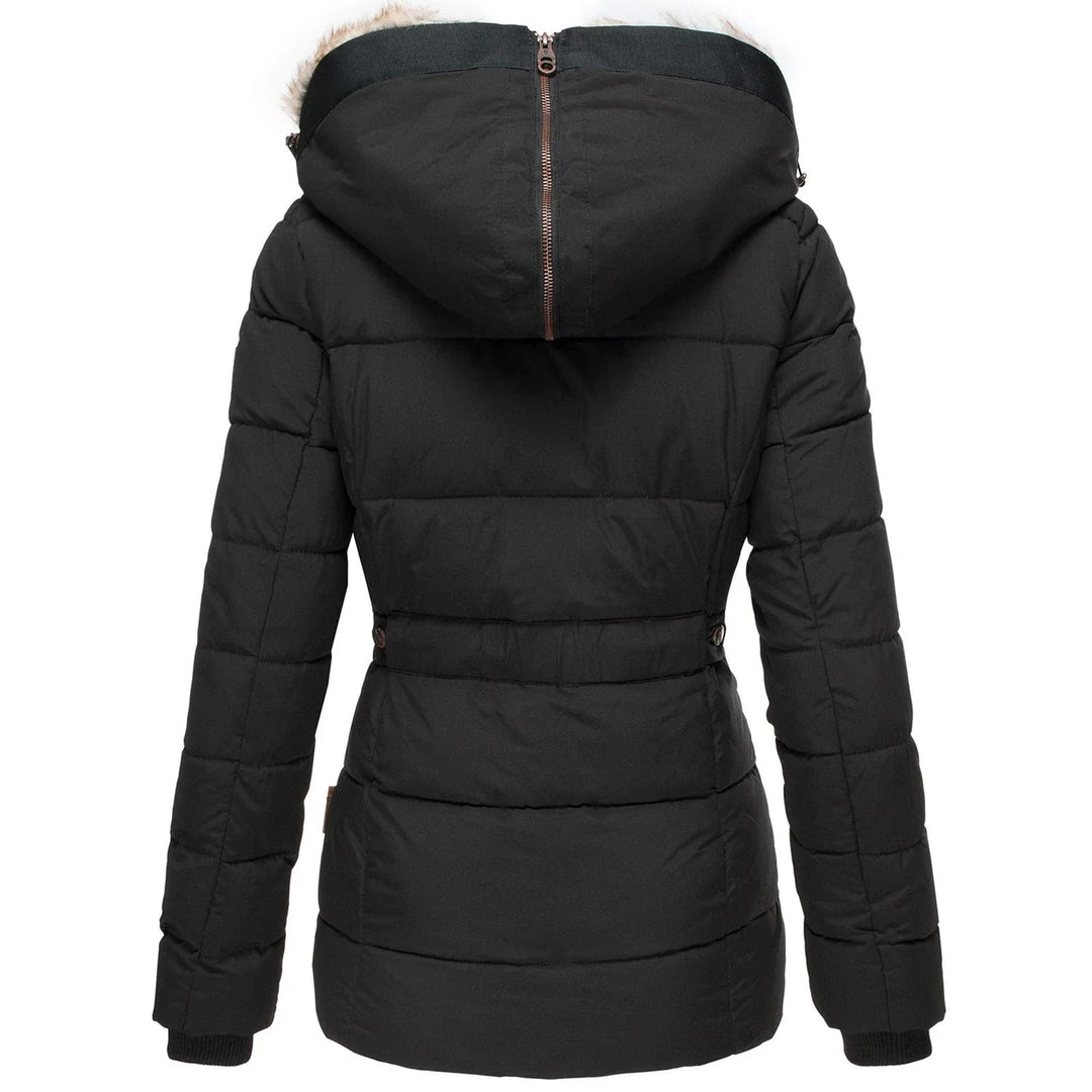 Fashionable women's quilted puffer jacket, ideal for winter style with its cozy plush hood.