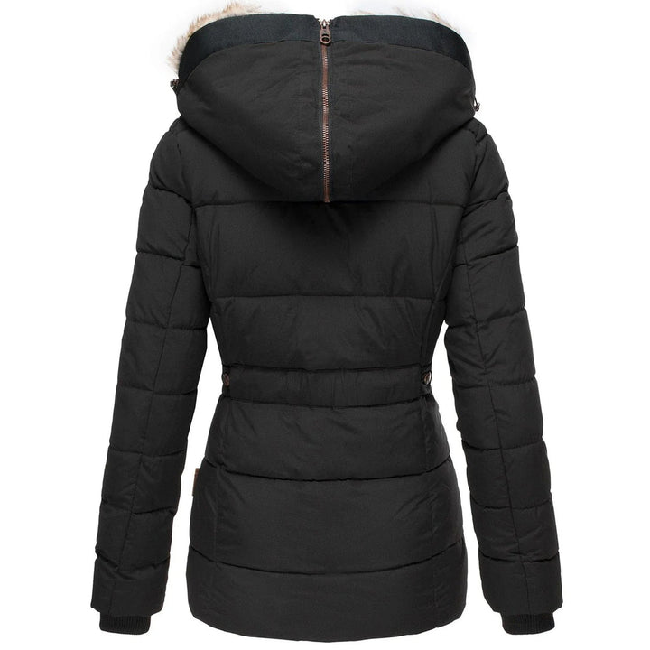 Fashionable women's quilted puffer jacket, ideal for winter style with its cozy plush hood.