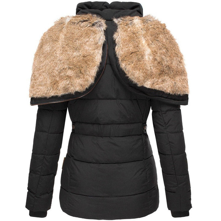 Women's elegant quilted puffer coat, providing superior winter warmth with a plush hood trim.