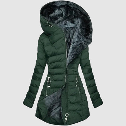 Warm women's quilted winter coat with a protective hood, designed for extreme cold weather. Cozy and functional outerwear.
